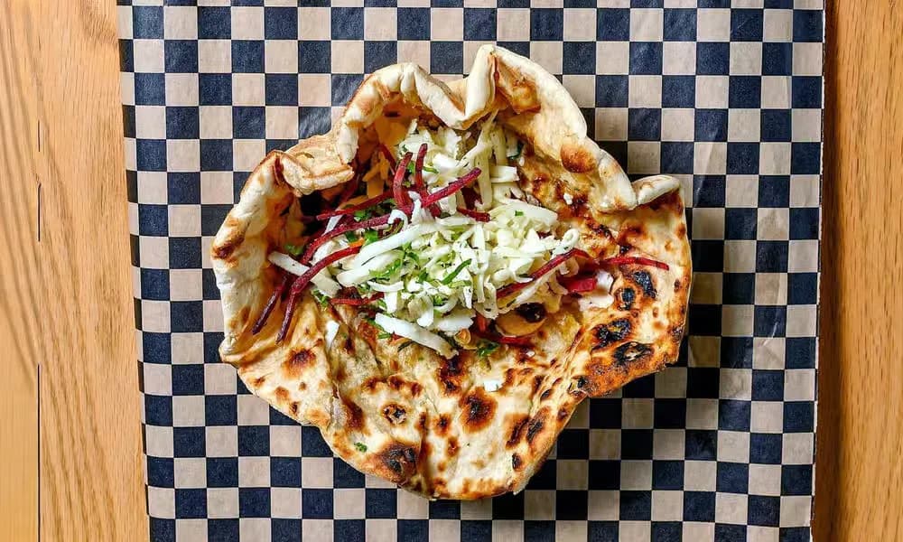 Chur Chur Naan in a lined bread basket.