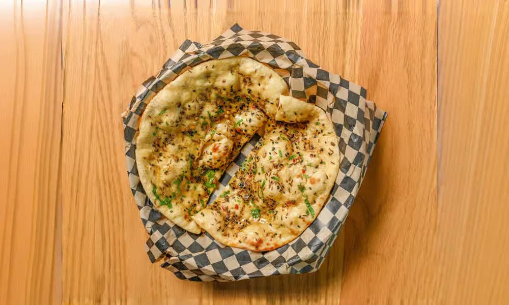 Masala Roti in a lined bread basket.