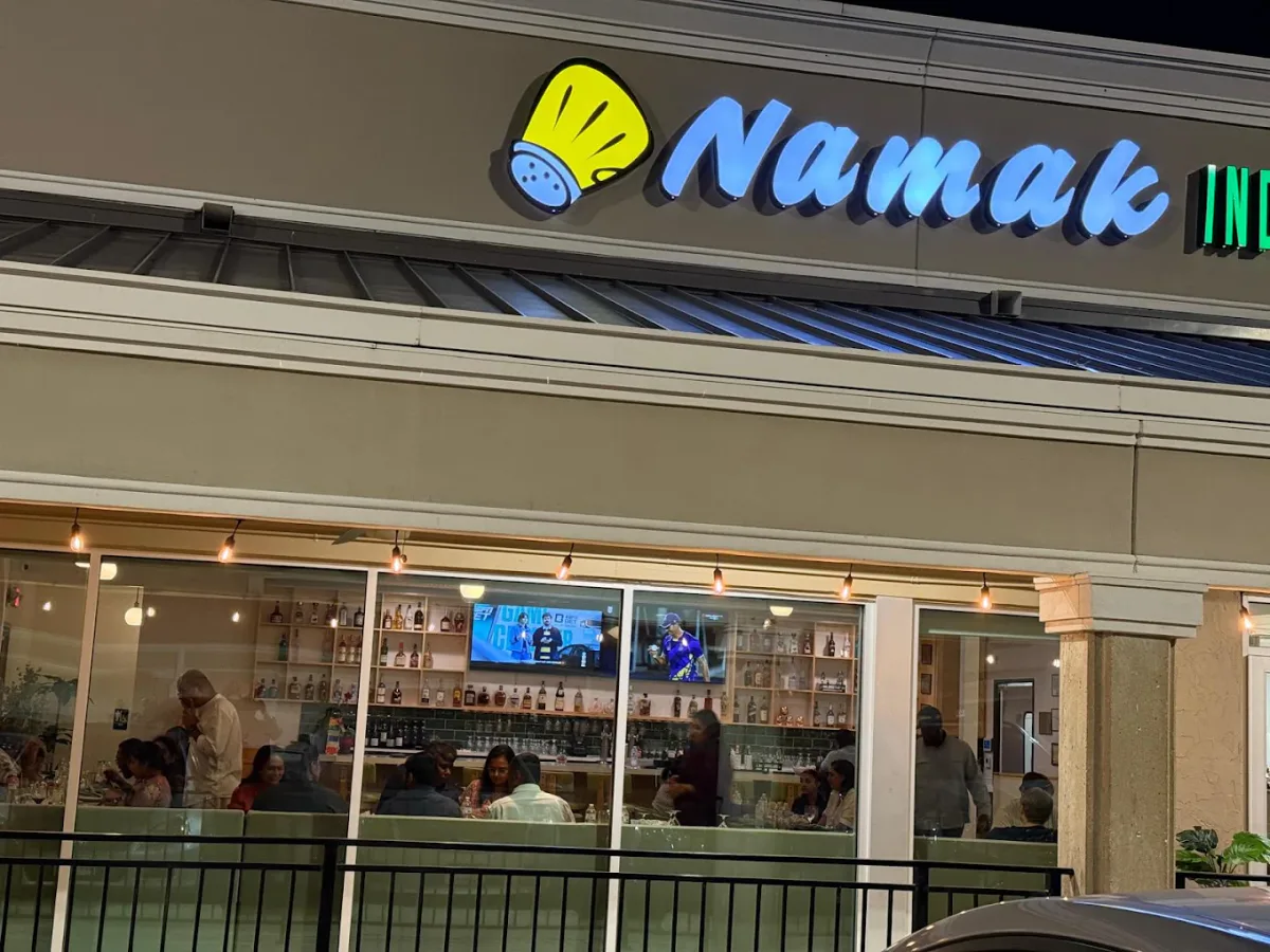 Namak Indian Restaurant & Bar exterior at night.