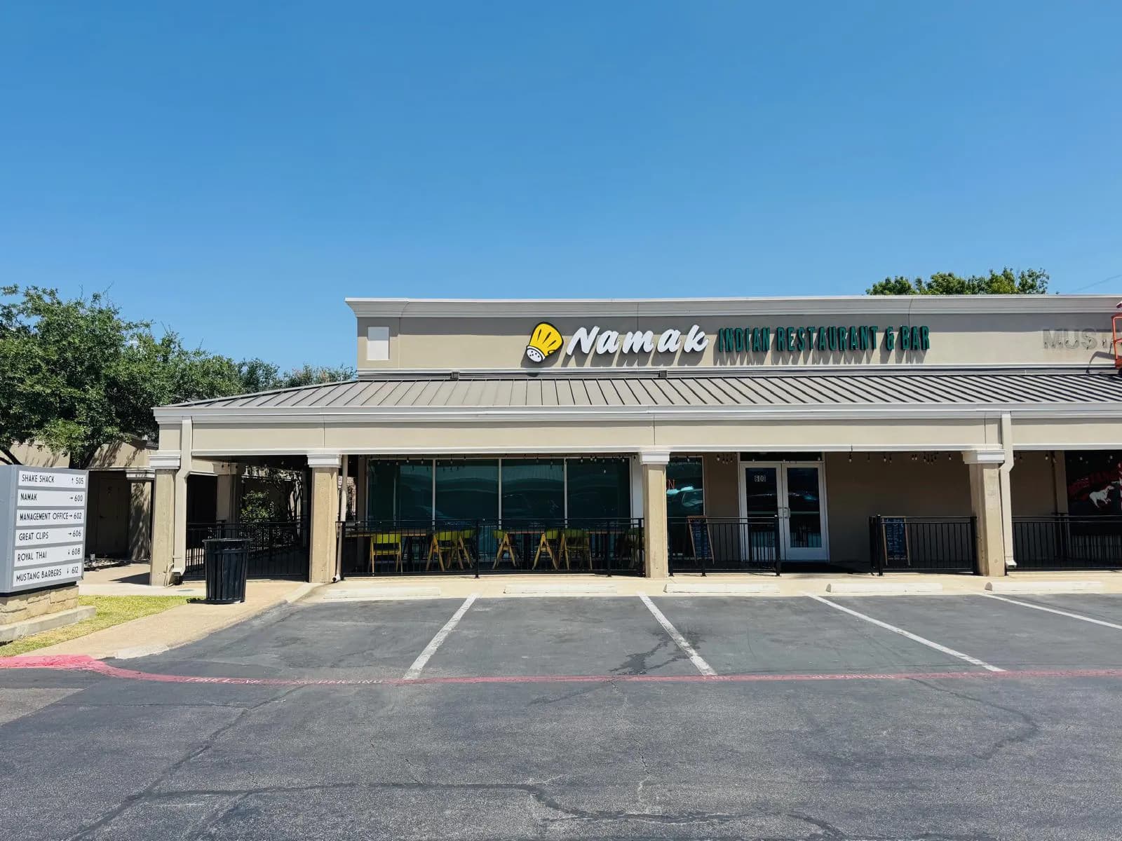 Full daytime exterior of Namak Indian Restaurant & Bar in Dallas.